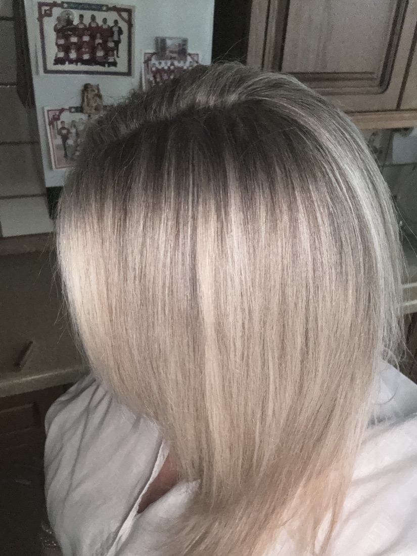 A soft blonde root melt and highlight blend coloured at Hairelite in Plaistow